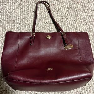 Burgundy Coach purse.